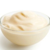 Bowl of mayonnaise based dip in clear glass bowl