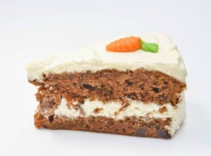 Piece of carrot cake against a white background