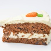 Piece of carrot cake against a white background