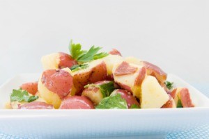 Red Potato Salad in a white dish