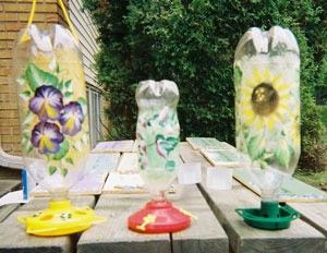 Decoupaged Pop Bottle Bird Feeders