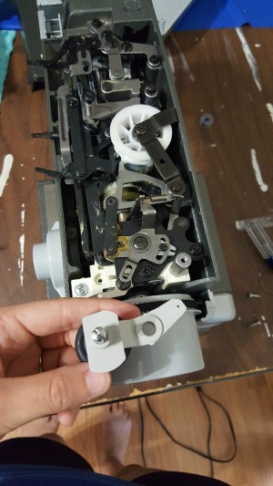 The bobbin winder on a Singer sewing machine.