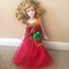 doll wearing a red evening gown