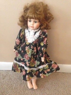 doll wearing a floral dress