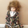 doll wearing a floral dress