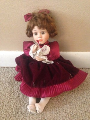 doll in red dress