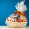 Gift Basket in cellophane against a blue background