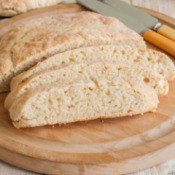 Yeast free quick bread on round cutting board
