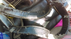 worn metallic purse straps
