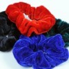 Pile of four hair scrunchies in different colors
