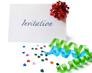 Blank Invitation surrounded by ribbons on confetti