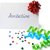 Blank Invitation surrounded by ribbons on confetti