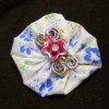 fabric yo yo brooch with decorative flower