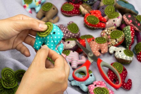 Hand sewing elephant crafts