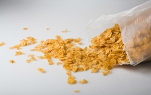 Bag of flake breakfast cereal spilling out on counter