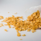 Bag of flake breakfast cereal spilling out on counter