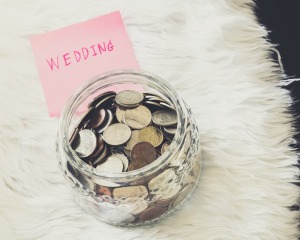 Jar with coins labelled Wedding