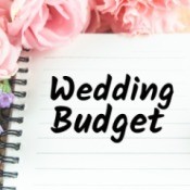 Notebook labelled Wedding Budget surrounded by flowers