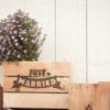 Wood crate with "Just Married" written on it.