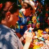Couple looking at crafts at an outdoor market