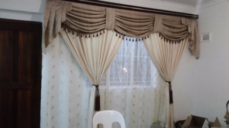neutral curtains with sheers