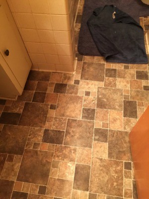 tile look vinyl flooring in browns and tans