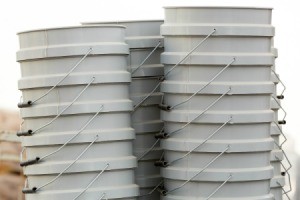 Stacks of 5 gallon buckets