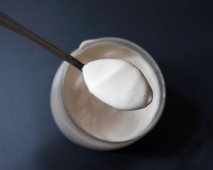Top view of a jar of mayonnaise with spoon
