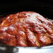 Ribs with BBQ sauce in a crock pot