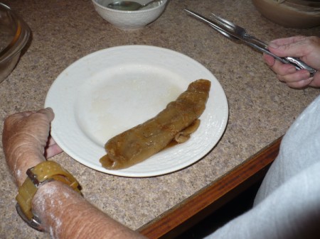 A rolled up crepe, ready to eat.