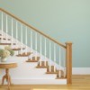 Staircase with wooden banister