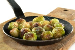 Browned Brussels Sprouts in a black skillet