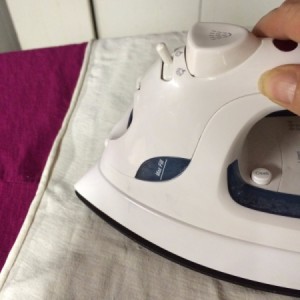 ironing with a press cloth