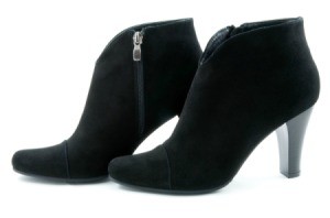 Black women's heeled suede booties