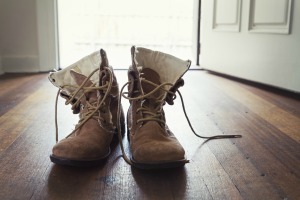 Pair of men's suede boots in hall