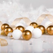 Gold and white golf balls with gold ribbon