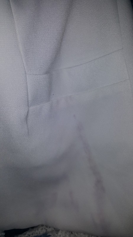 Black Dye Transferred on White Polyester Blazer