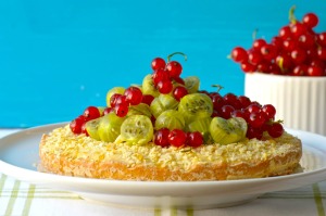 Pie topped with gooseberries and honey