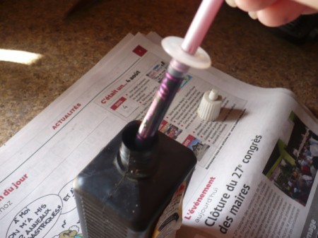 Refilling your ink cartridges at home.