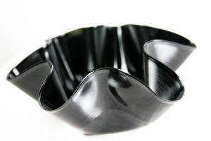 Bowl made from a black vinyl record