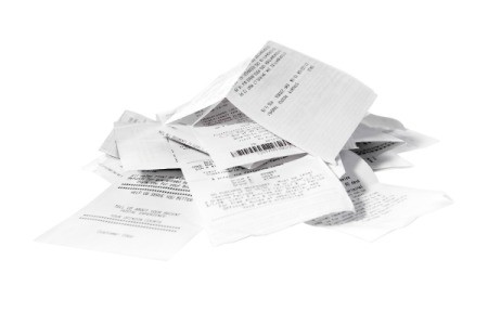 Pile of receipts on a white background