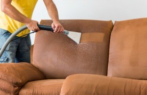 Steam cleaning a couch