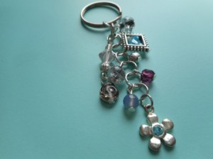 pretty beaded keychain on blue background