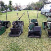 four old cylinder mowers