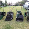 four old cylinder mowers