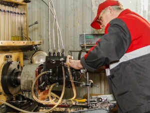 Man testing a diesel injector