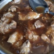 Chicken in brown sauce.