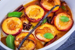 Peaches or nectarines baked with mint and syrup