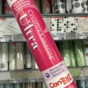 Contact paper tube in front of a contact paper display