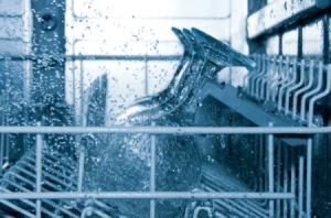 Inside view of dishwasher during wash cycle